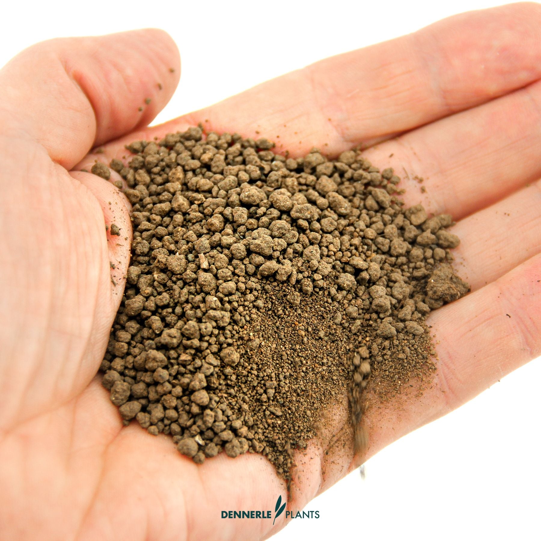 Hand holding Dennerle Plants substrate