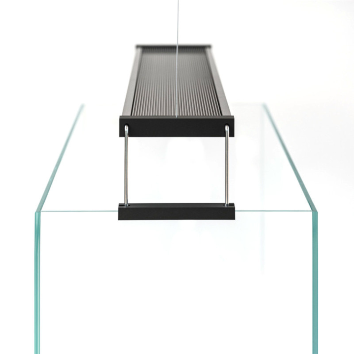 Side‑angled view of Twinstar S Line IV aquarium light - sleek aluminium design over aquarium